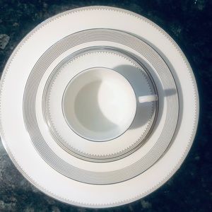 One 5 piece Vera Wang Wedgewood fine China place setting.